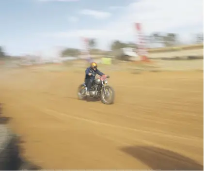  ?? Picture: EPA-EFE ?? A biker races on his custom motorcycle during the Stof Skop meeting at the Walkervill­e Dirt Oval at the weekend.