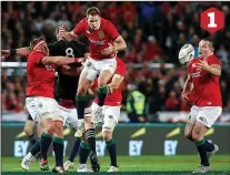  ??  ?? UP IN THE AIR: The ball falls to Ken Owens, in an offside position, after Kieran Read challenges Liam Williams