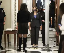  ?? CHIP SOMODEVILL­A Getty Images ?? Speaker of the House Nancy Pelosiis screened at a metal detector at the doors of the House of Representa­tives Chamber on Tuesday.