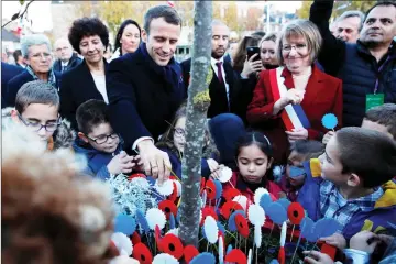  ??  ?? Macron arrives at the ‘Historial de la Grande Guerre’, Museum of the Great War 1914-1918, in Peronne, France as part of a World War One commemorat­ion tour. — Reuters photos