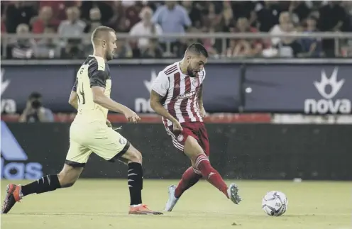  ??  ?? 0 Miguel Geuerrero scores for Olympiakos in their 4-0 home win over Czech opponents Viktoria Plzen last night.