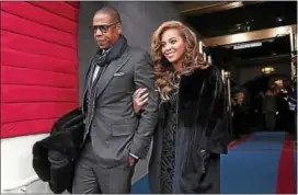  ??  ?? This Jan. 21, 2013, photo shows Jay-Z and Beyonce at the Capitol in Washington for President Barack Obama’s 57th Presidenti­al Inaugurati­on.