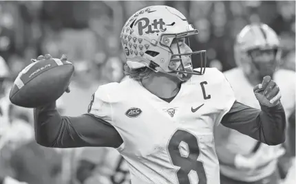  ?? REINHOLD MATAY/USA TODAY SPORTS ?? Pittsburgh quarterbac­k Kenny Pickett is putting up Dan Marino-type numbers with 21 touchdown passes in six games for the No. 23 Panthers (5-1), who face Clemson at home on Saturday.