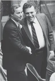  ?? PNG FILES ?? Former Premier Bill Bennett, left, shares a rare cordial moment with Dave Barrett, the NDP leader who would defeat him.