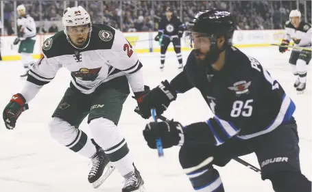  ?? KEVIN KING ?? Minnesota Wild defenceman Matt Dumba, left, says it’s important that the dialogue surroundin­g racism in the NHL continues .