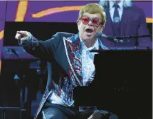  ?? ETHAN MILLER/GETTY ?? Elton John performs Nov. 1 during a stop on the Farewell Yellow Brick Road tour in Las Vegas.