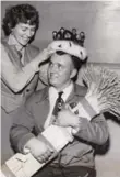  ?? TORONTO STAR ARCHIVES ?? Ron Leonhardt, 19, of Drumheller, Alta., holds a sheaf of first-prize Marquis wheat after being named the 1952 Wheat King.