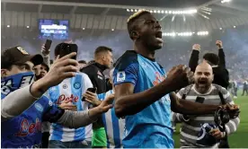  ?? Italy. Photograph: Andrea Staccioli/AFP/Getty Images ?? Victor Osimhen celebrates after Napoli’s 1-1 draw at Udinese made them champions of