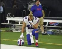  ?? ERIC CHRISTIAN SMITH - THE ASSOCIATED PRESS ?? Buffalo Bills running back Patrick DiMarco (42) kneels on the sideline after an NFL wild-card playoff football game against the Houston Texans Saturday, Jan. 4, 2020, in Houston. The Texans won 22-19 in overtime.