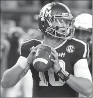  ?? AP/GEORGE BRIDGES ?? Texas A&M quarterbac­k Kyle Allen isn’t as dynamic at Texas Tech’s Patrick Mahomes, but his 61.4 completion percentage is better than Mahomes’ percentage before playing Arkansas.