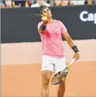  ?? Gallo Images / Getty Images ?? Rafael Nadal serves during The Match in Africa against Roger Federer at Cape Town Stadium on Friday in Cape Town, South Africa.