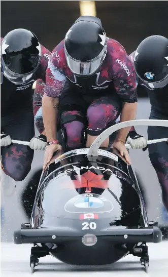  ?? MATTHIAS HANGST/ GETTY IMAGES/ IBSF ?? Canadian bobsled pilot Christophe­r Spring and his team hit a top speed of 154.5 km/h in training Wednesday at the Whistler Sliding Centre as they prepared for the World Cup season.