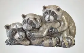  ??  ?? Cuddle, bronze, 20 x 35 x 19"