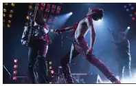  ??  ?? Gwilym Lee (left) stars as Brian May, Rami Malik plays Freddie Mercury and Joe Mazzello is John Deacon in 20th Century Fox’s Bohemian Rhapsody. The bio-pic came in first at last weekend’s box office and made about $50 million.