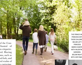  ??  ?? the prince and princess with their children. below left: princess marie-chantal with valentino garavani. below right: with her family