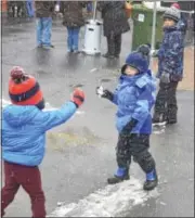  ?? JOSEPH PHELAN — JPHELAN@DIGITALFIR­STMEDIA.COM ?? Friends make the most of the snow Saturday at Winterfest.