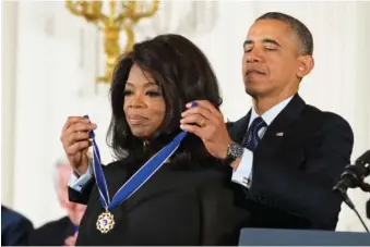  ?? EVAN VUCCI /THE ASSOCIATED PRESS ?? President Barack Obama awarded Oprah Winfrey the Presidenti­al Medal of Freedom in 2013.