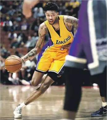  ?? Rick Loomis Los Angeles Times ?? TURNING THE CORNER has been a challenge for rookie forward Brandon Ingram. The No. 2 overall draft pick followed a strong run of games earlier this month with consecutiv­e scoreless efforts this week.