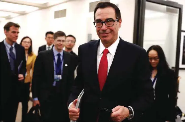  ??  ?? WASHINGTON: Treasury Secretary Steven Mnuchin arrives for a meeting with Chinese Finance Minister Xiao Jie during the G20 at the 2017 World Bank Group Spring Meetings in Washington yesterday.—AP