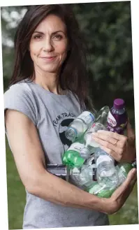  ??  ?? Bottled up: Julia Bradbury with her finds