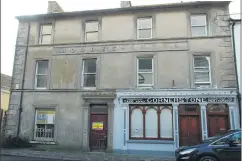  ?? (Photo: Katie Glavin) ?? The former Moore’s Hotel on Main Street in Cappoquin will be redevelope­d under the regenerati­on to feature office or retail space on the ground floor with residentia­l property space on the upper floors.