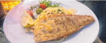  ?? FOTO: NYF ?? Zart, saftig und herrlich mediterran: Zander mit gebutterte­n Linguine.