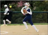  ?? OWEN MCCUE - MEDIANEWS GROUP ?? Spring-Ford’s second baseman Morgan Lester throws across her body for an out against Methacton on Wednesday.