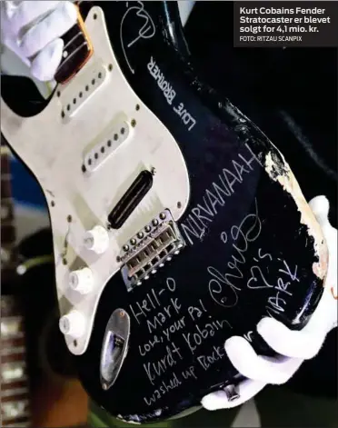  ?? FOTO: RITZAU SCANPIX ?? Kurt Cobains Fender Stratocast­er er blevet solgt for 4,1 mio. kr.