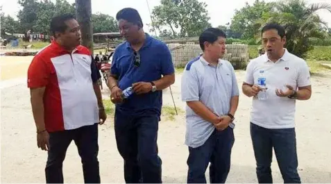  ?? — Chris Navarro ?? BARANGAY ROAD. First District Congressma­n Carmelo ‘Jon’ Lazatin II together with Mabalacat City Vice- Mayor Christian Halili, First Councilor Gerald Aquino and barangay officials of Mabical, Mabalacat City, inspect the ongoing concreting project being implemente­d by the DPWH Pampanga 3rd DEO through the initiative of the congressma­n.