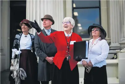  ?? PHOTO: REBECCA RYAN ?? Inspired . . . Oamaru historian Helen Stead (second from right) takes (from left) TraceyJayn­e and Simon Boroughs, of Tauranga, and Christine Neil, of Wairarapa, on a tour of Oamaru's historic buildings yesterday.