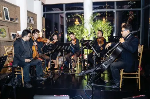  ??  ?? R Manila String Machine arranged a beautiful medley for guests