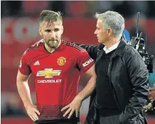  ?? Picture: AFP/Oli SCARFF ?? HUGE RECOVERY: Manchester United manager Jose Mourinho, right, consoles Luke Shaw. Shaw has been included in England squad to face Spain next month.