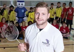  ??  ?? Different racket: rugby star Finn Russell is an ambassador for the 2017 Badminton World Championsh­ips to be held in Glasgow