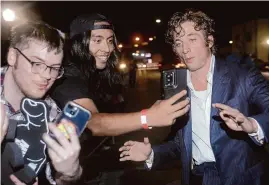  ?? Tom Fox/The Dallas Morning News/TNS ?? Actor Jeremy Allen White, seen with fans in November, is among those being considered to play Bruce Springstee­n in an upcoming biopic.