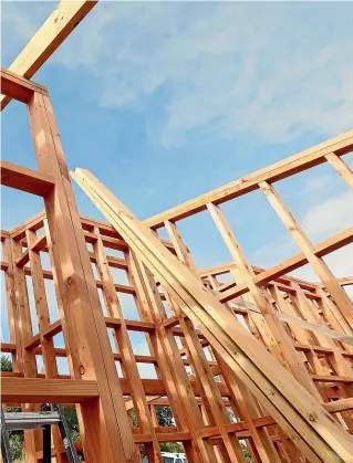  ?? MARTIN DE RUYTER/STUFF ?? Building with a low carbon-intensity material such as wood framing can help create a green home – but an energy certificat­e would help confirm how well that property performed for would-be buyers.