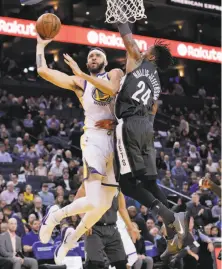  ?? Carlos Avila Gonzalez / The Chronicle ?? JaVale McGee (left, against the Nets’ Rondae Hollis-Jefferson on Tuesday) is known in the music world as “Pierre.”