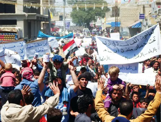  ?? AFP ?? Main: Antigovern­ment protesters in 2011 rallied in Deraa, where mass graves were discovered; below: ProAssad forces in the city allegedly burnt corpses to hide their crimes; bottom: In Sweida, to Deraa’s east, the regime received strong support.