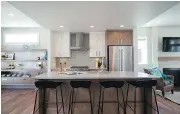  ??  ?? The kitchens feature quartz countertop­s and upgraded appliances.