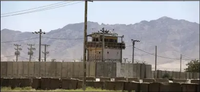  ?? ASSOCIATED PRESS ?? In this June 25 file photo, a wall surrounds Bagram Air Base in Afghanista­n.