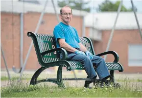  ?? MATHEW MCCARTHY WATERLOO REGION RECORD ?? Wayne Lantz sits on a bench dedicated to him at John Darling Public School in Kitchener on Friday. Lantz retired after a 52-year career with the board.