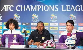  ?? Courtesy: Al Ain ?? All or nothing Al Ain coach Zlatko Dalic (right) and Omar Abdul Rahman (left) along with a club official at a press conference ahead of their AFC Champions League clash against Al Ahli in Abu Dhabi.