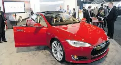  ?? STAN HONDA/AFP/ Gett y Imag es files ?? Elon Musk, owner of Tesla Motor Inc., says an annual selling rate of 40,000 Model S Teslas by the end of next year looks “pretty safe.”