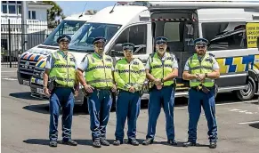  ?? ANDY JACKSON/STUFF ?? Members of the Taranaki Police Impairment Prevention Team, from left, Constable Brad Chapman, Constable Gary Toa, Senior Constable Greg Neilsen, Sergeant Pat Duffy and Constable Isaac Radich with the new Mobile Road Safety Base which will be trialled on the region’s roads this summer.