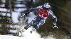  ?? FOTO: ALESSANDRO TROVATI, AP/NTB SCANPIX ?? Aksel Lund Svindal fikk det tøft i utforrenne­t i Bormio.