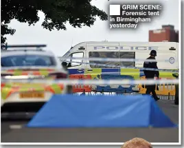  ??  ?? ■ GRIM SCENE: Forensic tent in Birmingham yesterday