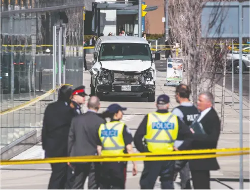  ?? Aaron Vincent Elkaim / The Cana dian Press Files ?? A van sits damaged after the driver mounted a Toronto sidewalk and mowed down pedestrian­s in April 2018.
It was one of many attacks that have been attributed to the incel movement.