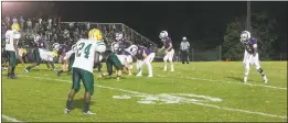  ?? STAFF PHOTO BY TAMMY SHOWALTER ?? McDonough sophomore quarterbac­k William Golden gets the play call off to his offense in Friday night’s conest against the Great Mills Hornets. Golden’s 33-yard touchdown pass to Demarco Davis with 3:46 left in the fourth quarter gave the Rams the lead...