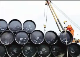  ?? ?? Oil prices rose yesterday but are headed for their first weekly loss in three weeks.(Pic:Reuters)