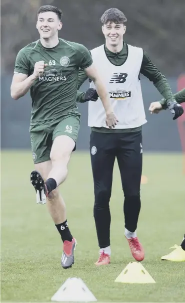  ??  ?? 0 Kieran Tierney, left, is back in training and should be fit to play on Hamilton’s plastic pitch tomorrow.