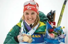  ?? Foto: dpa ?? Mit Gold, Silber und Bronze ist Denise Herrmann die erfolgreic­hste deutsche Biathletin bei der WM in Östersund.